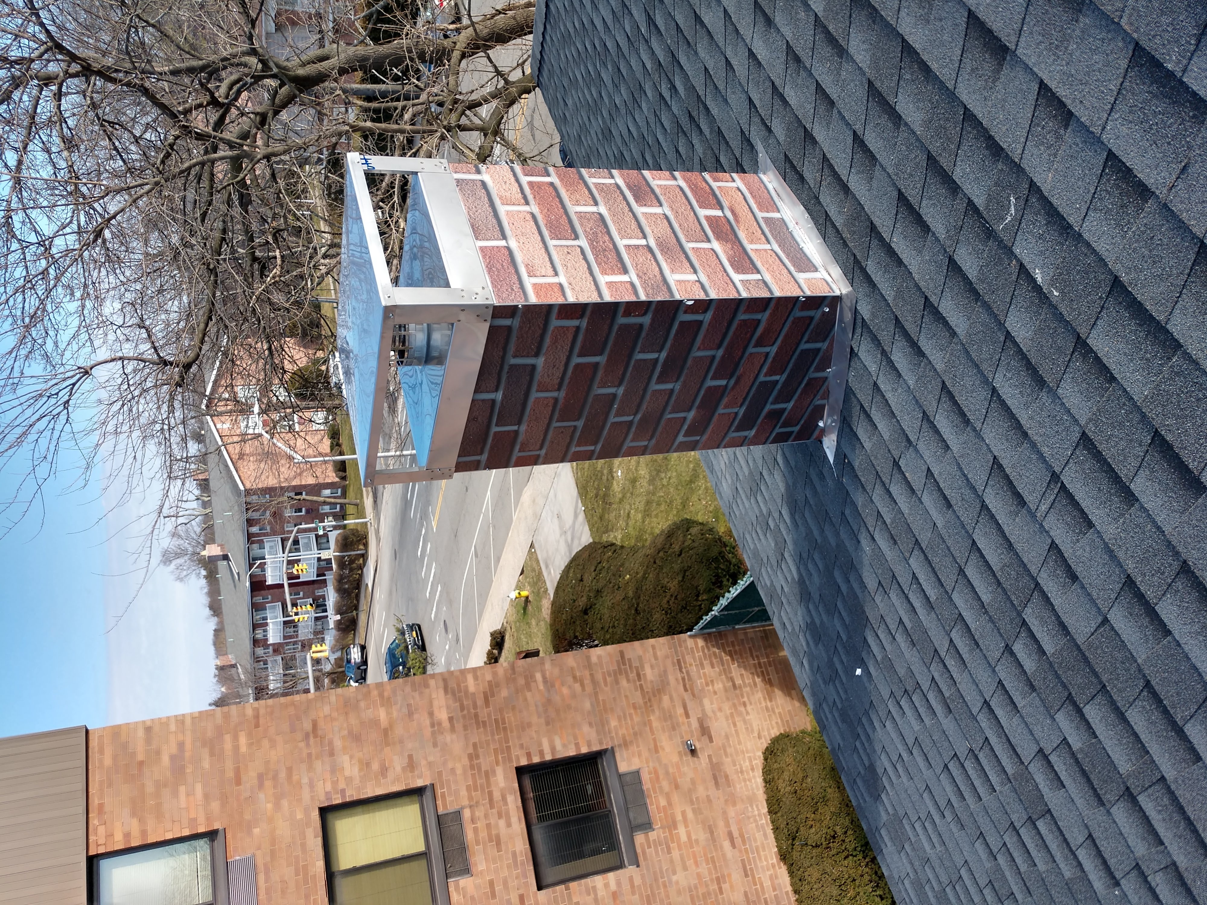 New elastomeric sealant applied to chimney crown in Massapequa, NY